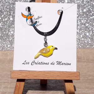 Oiseau jaune et paillette